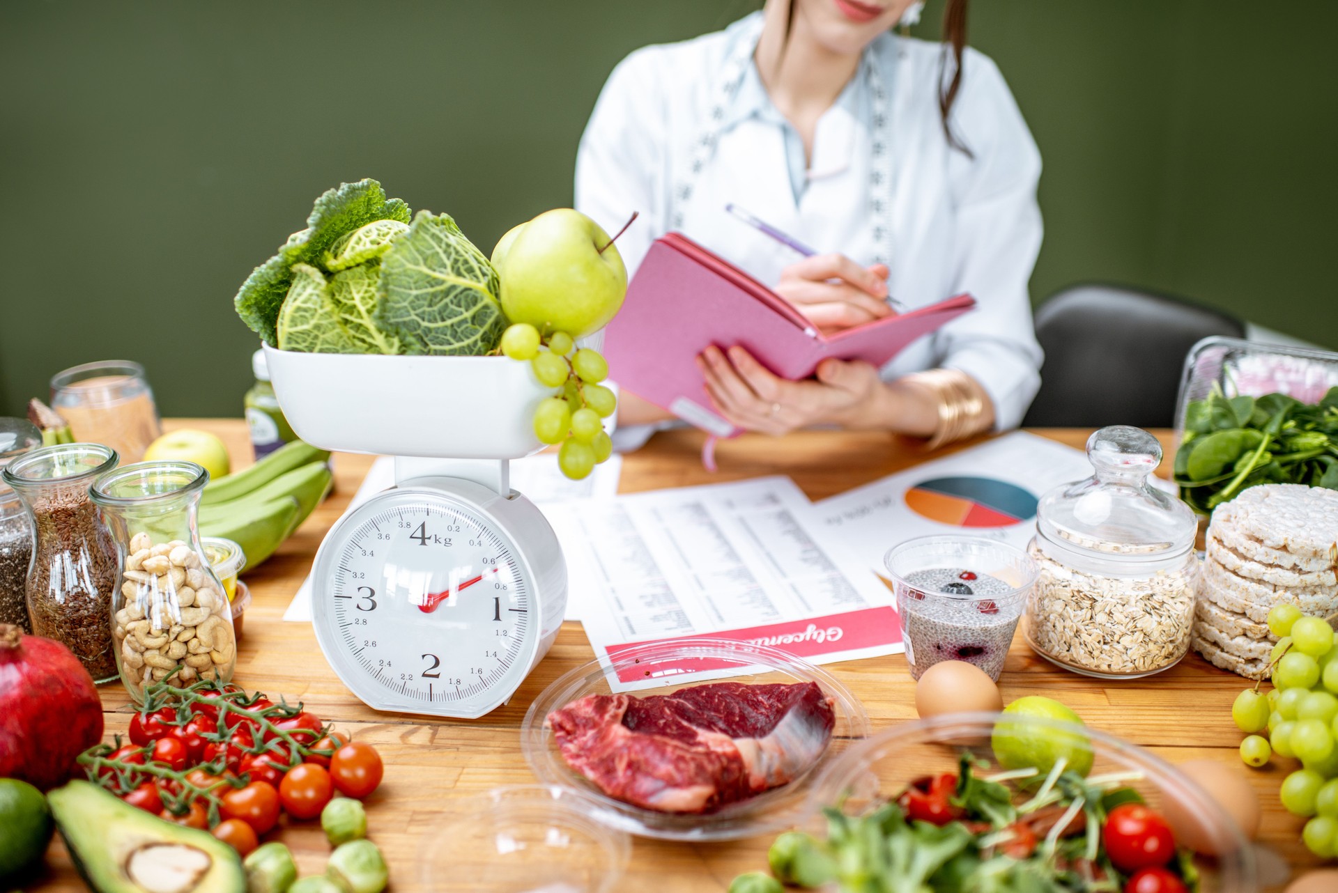 Dietitian with healthy food in the office